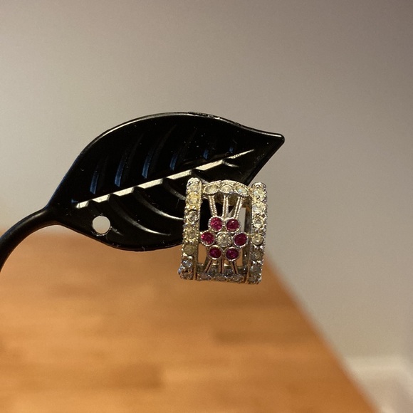 Earrings.  Rhinestone huggies with pink flowers.  L: 1/2 in.  Never worn - Picture 2 of 4